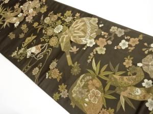 玩具に花々・雛人形模様織出し袋帯